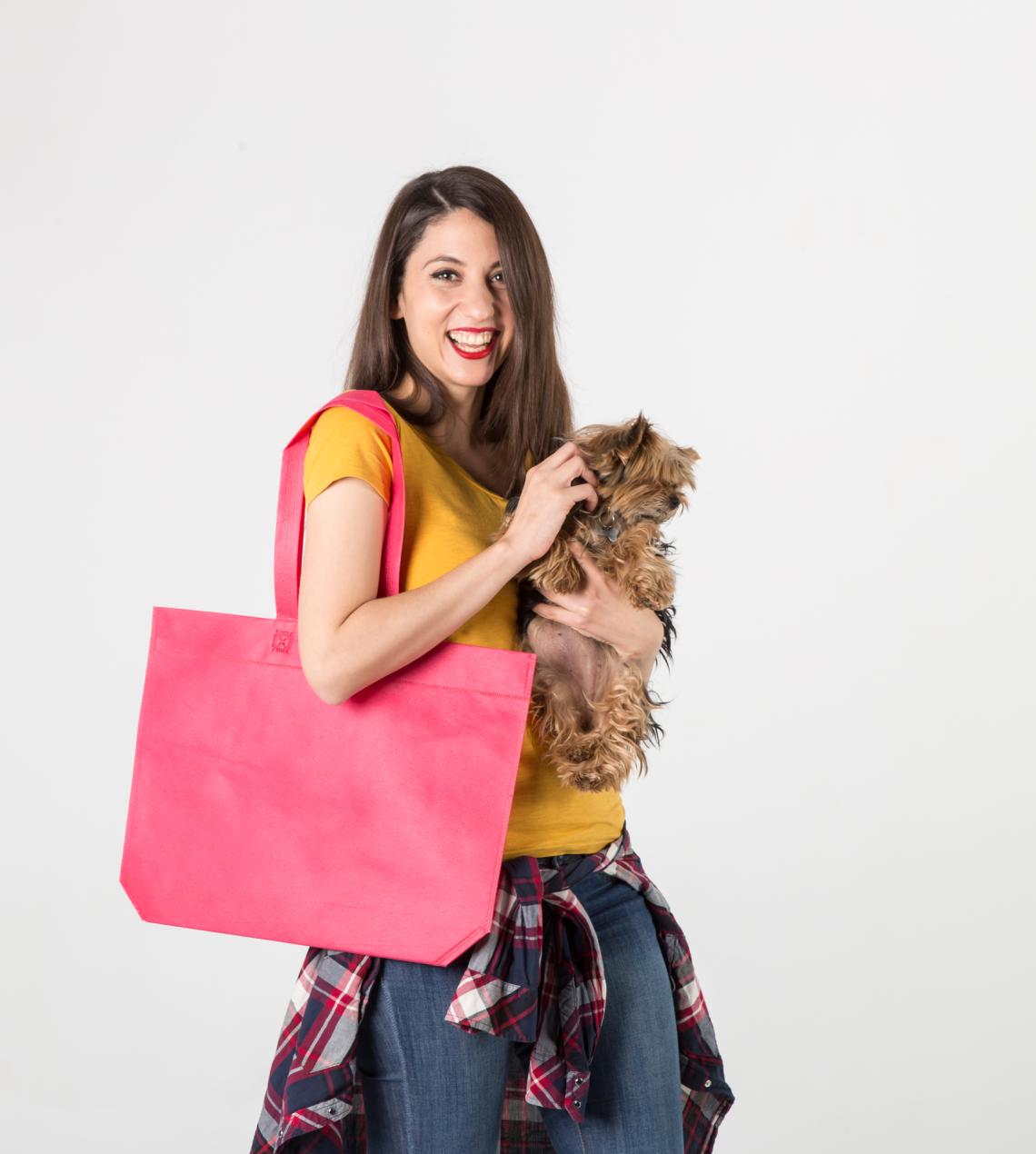 Bolsas de tela reciclada con asas largas y huelle en base fucsia