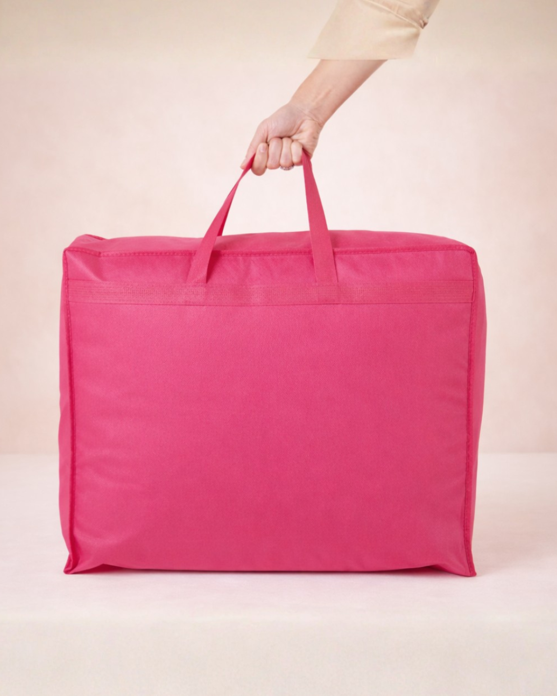 Bolsa para guardar edredones cerrada de color fucsia 60x50x20