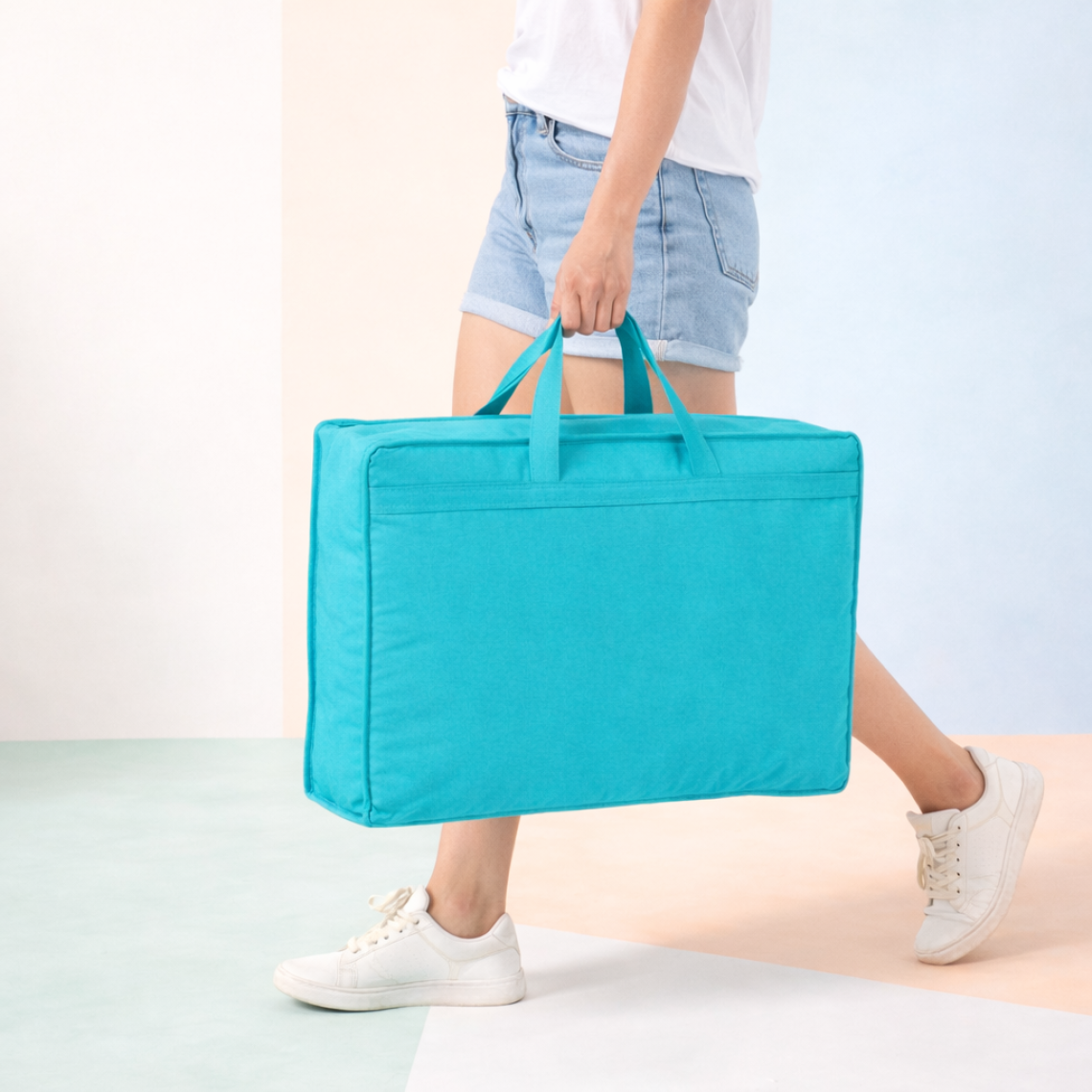 Bolsa para guardar edredón con asas de color fucsia 55x45x15