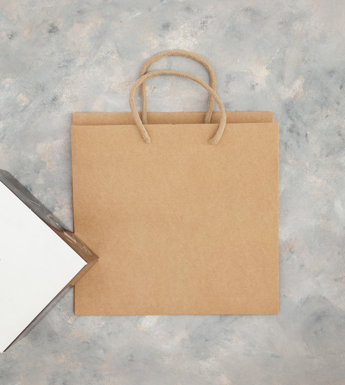 Bolsas de papel kraft con asas de cordón con base ancha