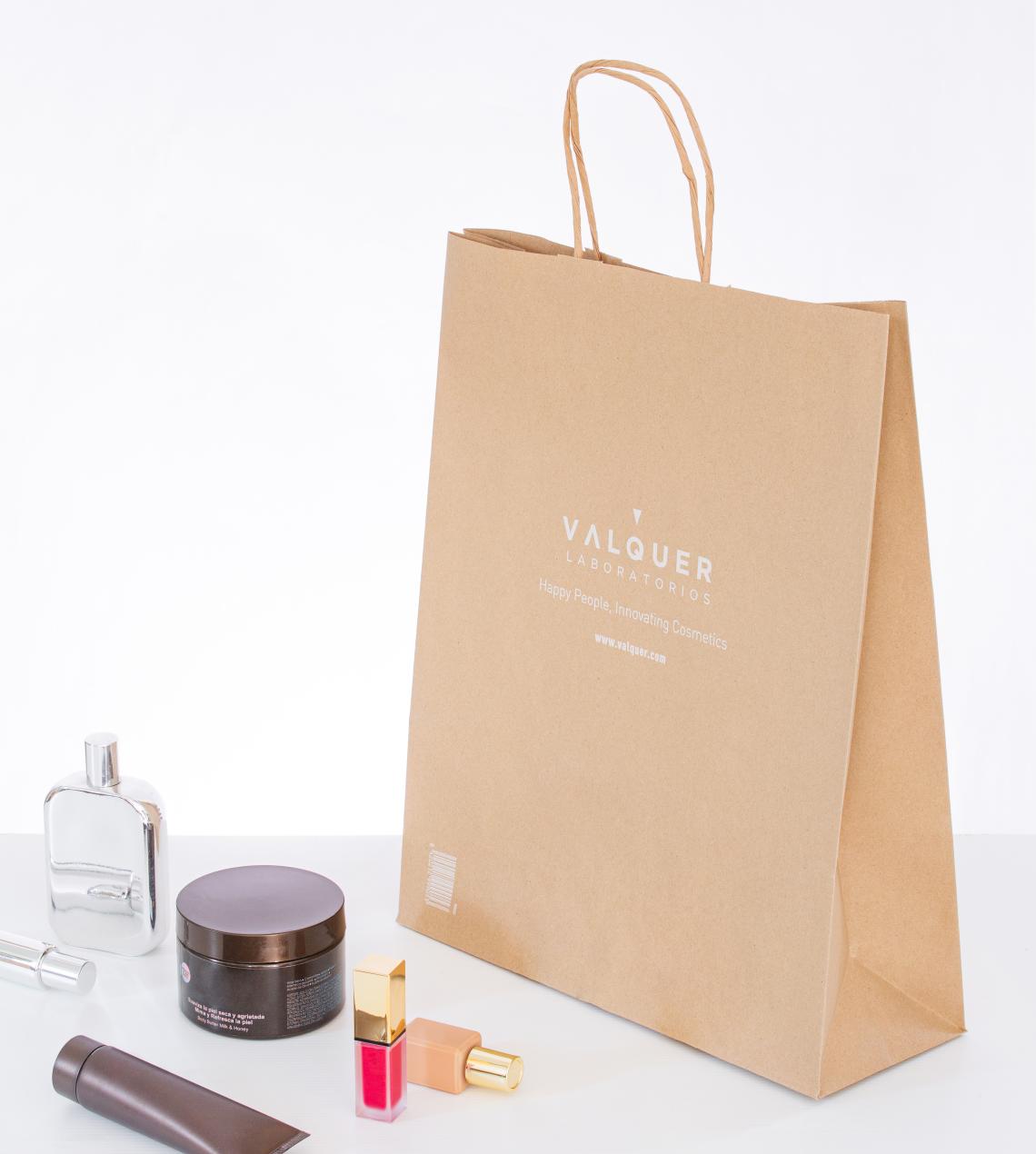 Bolsas de papel medianas con asas rizadas impresas