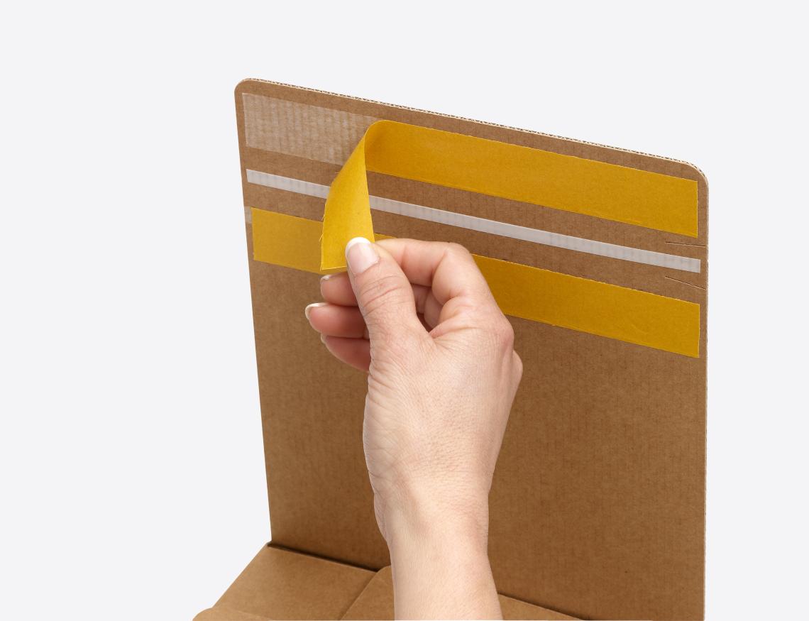 Cajas de cartón con 2 tiras adhesivas para envíos y devoluciones