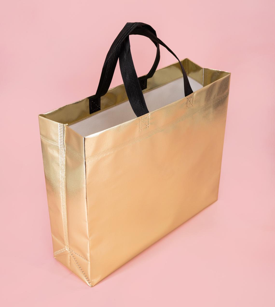 Bolsas de tela con asas cortas de color oro grandes