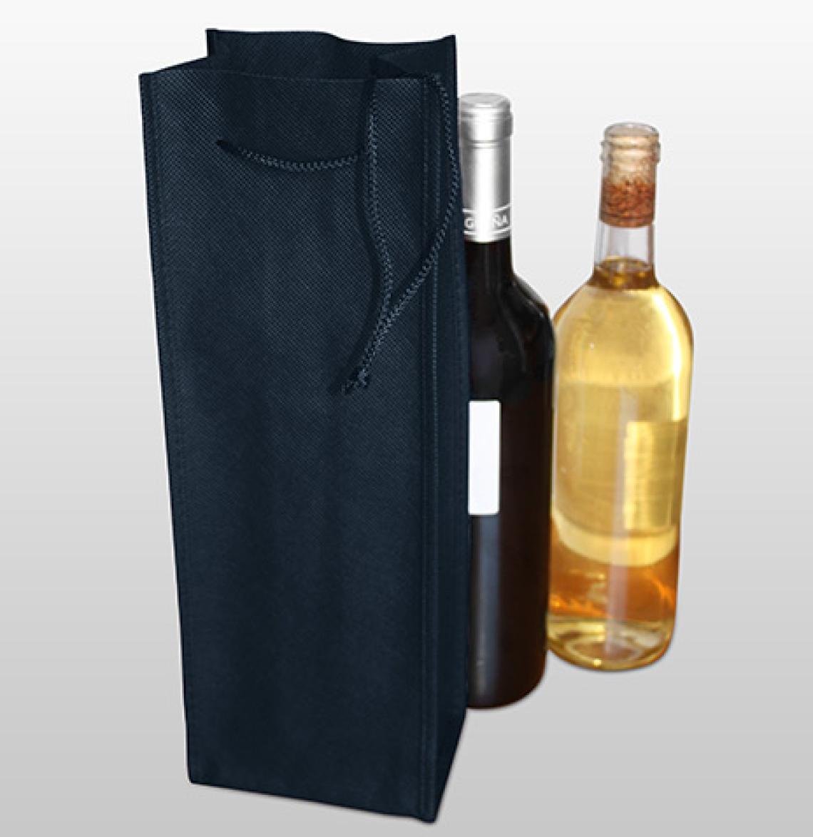 Bolsas de tela a medida junto a una botella