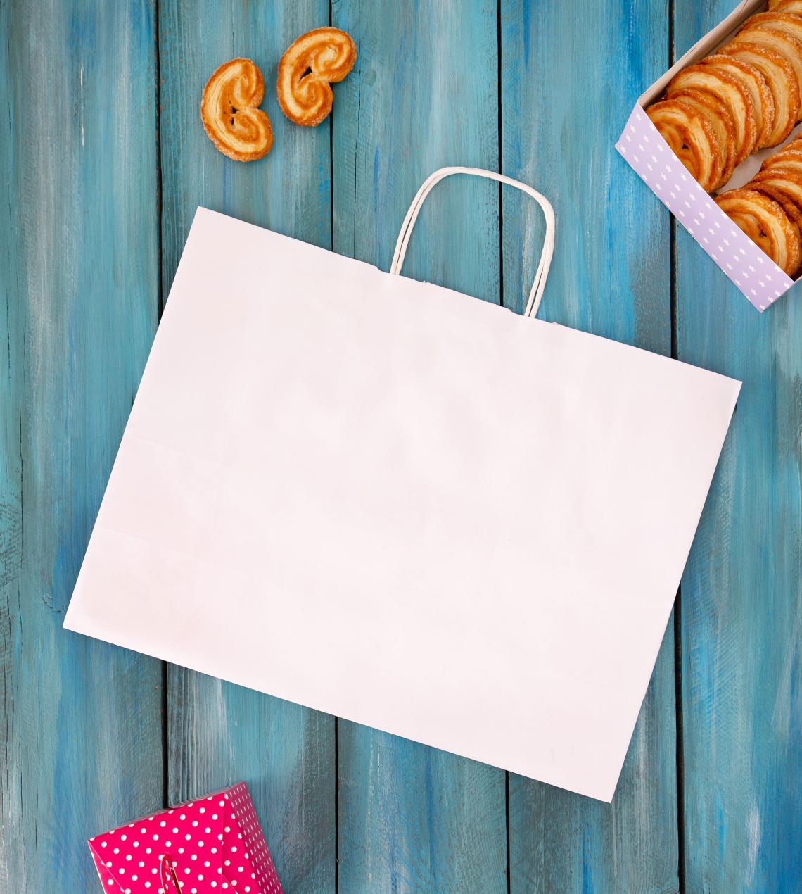 Bolsas de papel de blancas medianas para tiendas