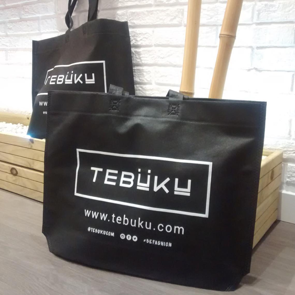 Bolsas de tela negras grandes con asas largas y fuelle en base impresas