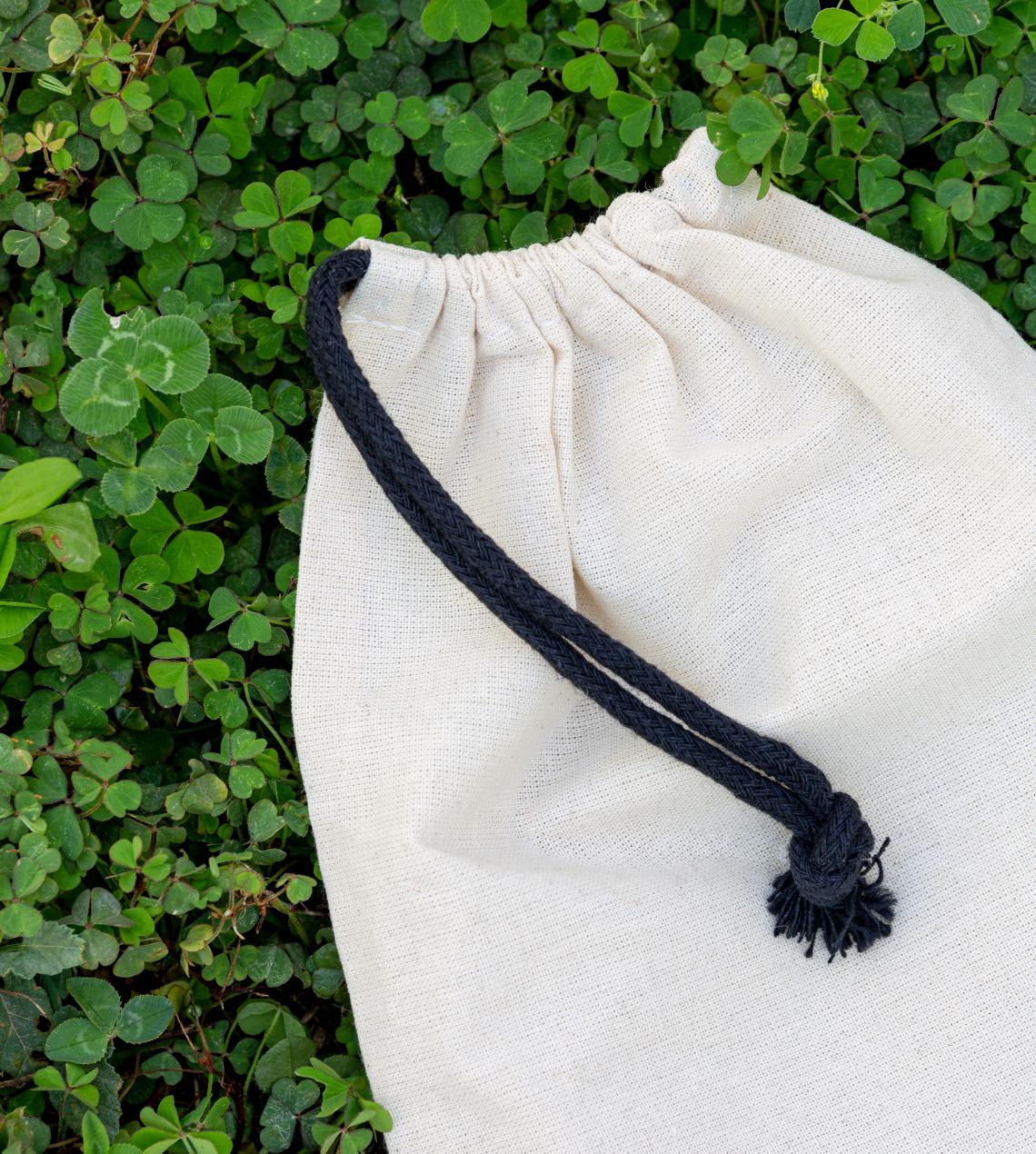 Sacos de algodón crudo ecológico con cierre de cordones negros