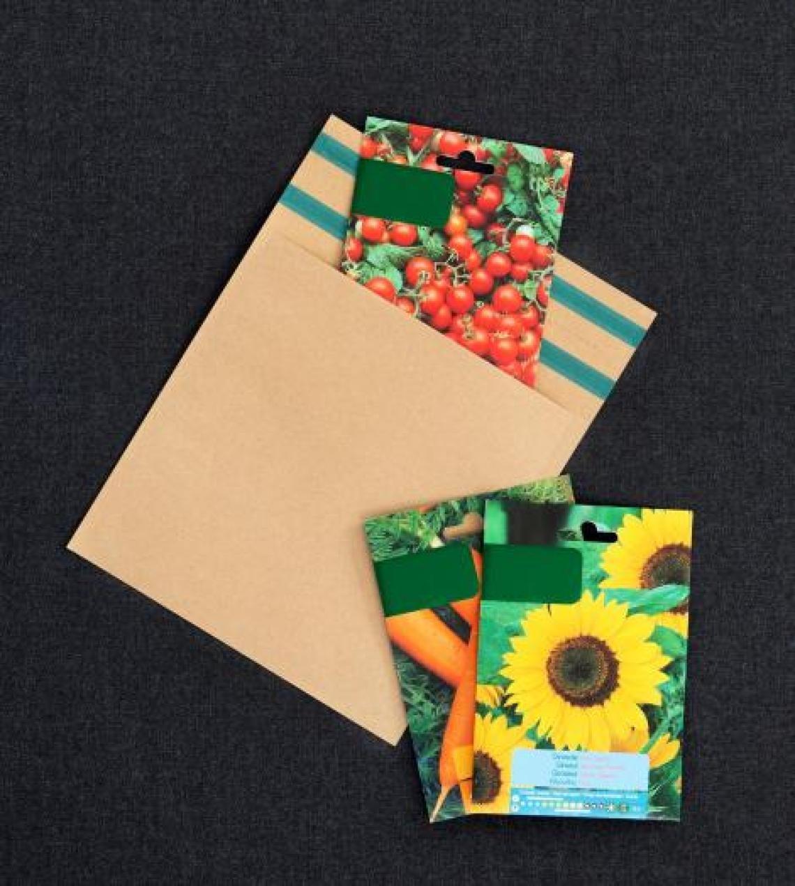 sobres de papel con tiras adhesivas con sobres de semillas al lado