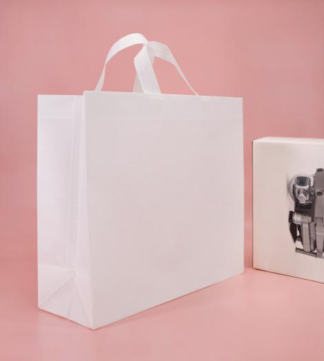 Bolsas hechas con tejido reciclado Bolsas hechas con tejido reciclado blanco